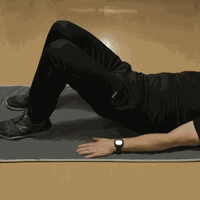 Short clip of a person doing bridge exercise
